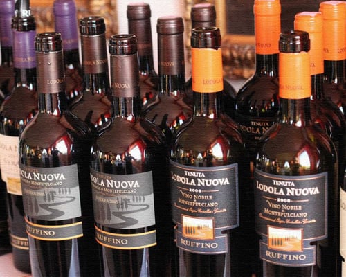 wine-bottles-lined-up-on-table_wine_sales_stimulator